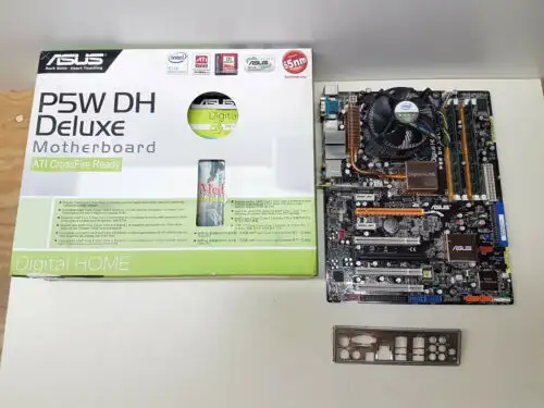 Asus P5W-Dh Deluxe Rev 1.02G + Core2Quad Q6600 + 4Gb + I/O Shield + More