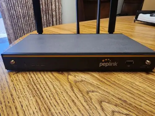Peplink Balance 20X Router W/ Cat7 Ltea Modem And Original Box